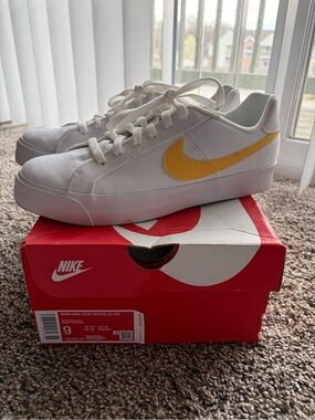 Nike Women’s White Sneakers with Yellow Swoosh